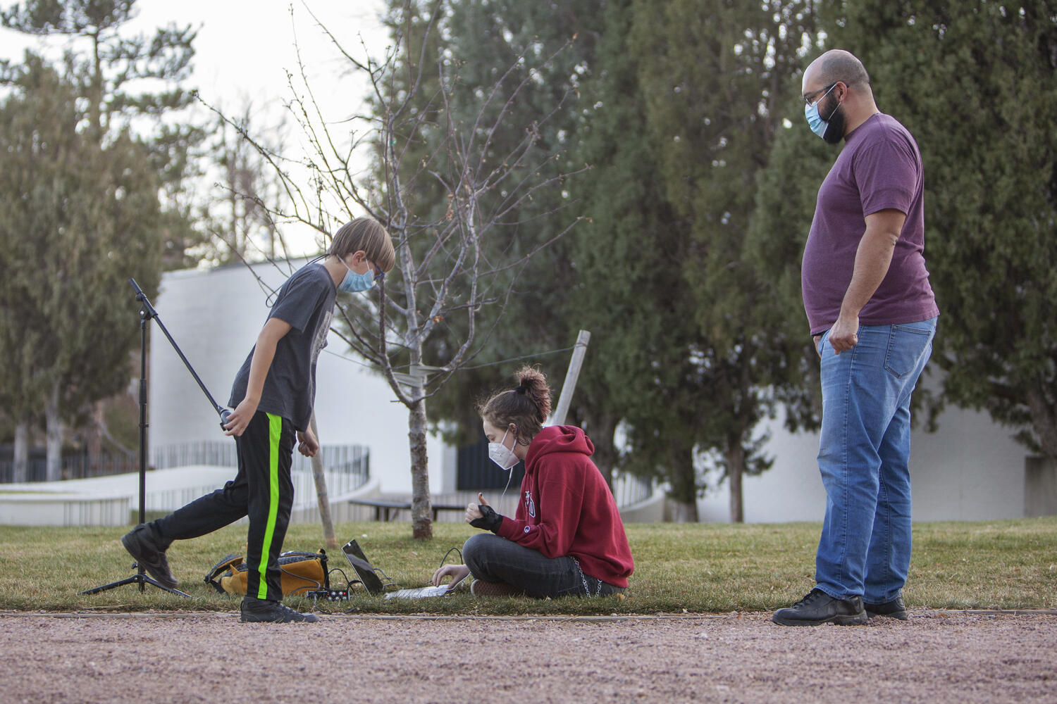 A 5th grader walks in place while senior Madeline K. records the sound needed fo