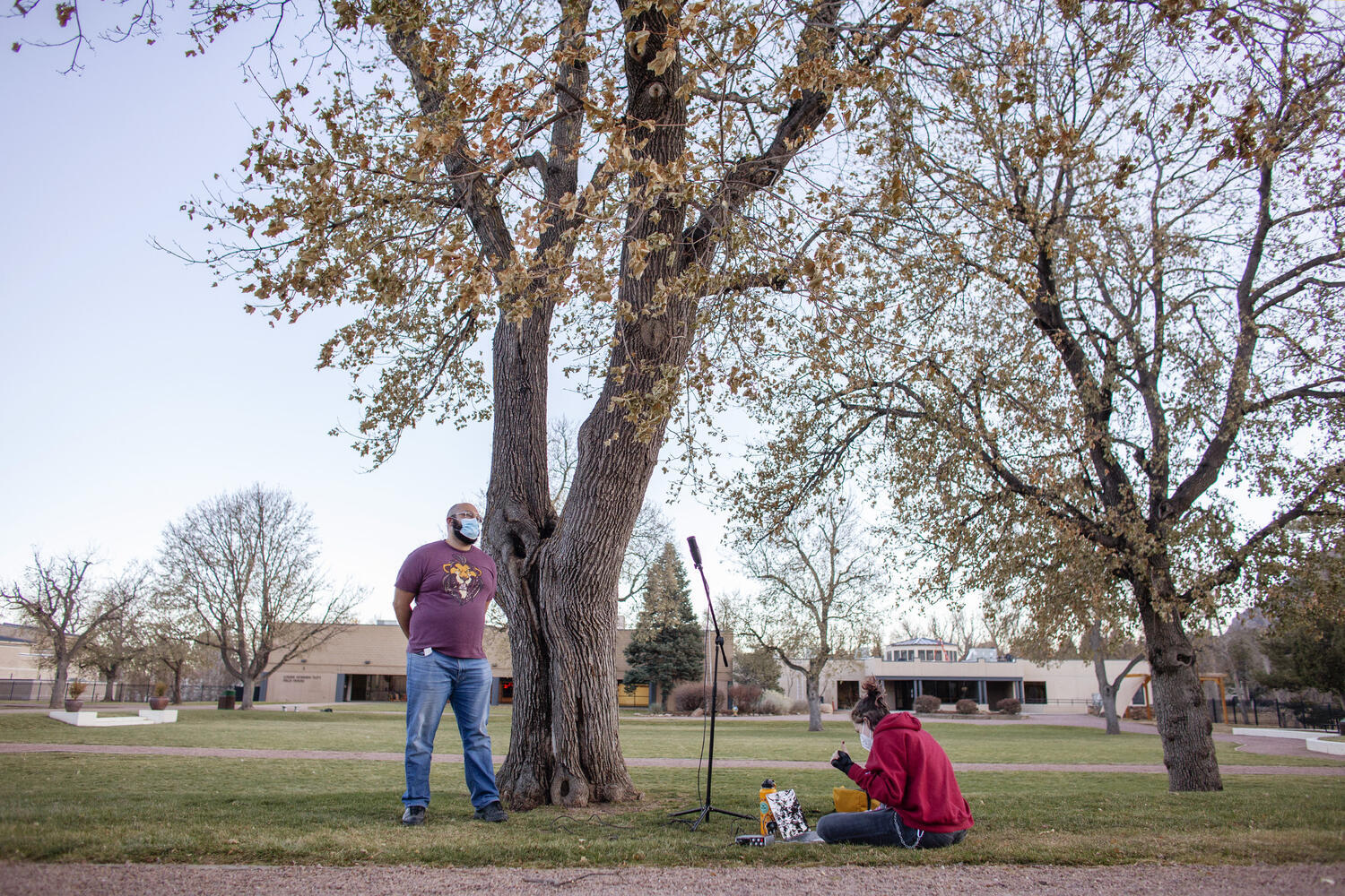 Senior Madeline K. records the sound of leaves blowing in the wind while theatre