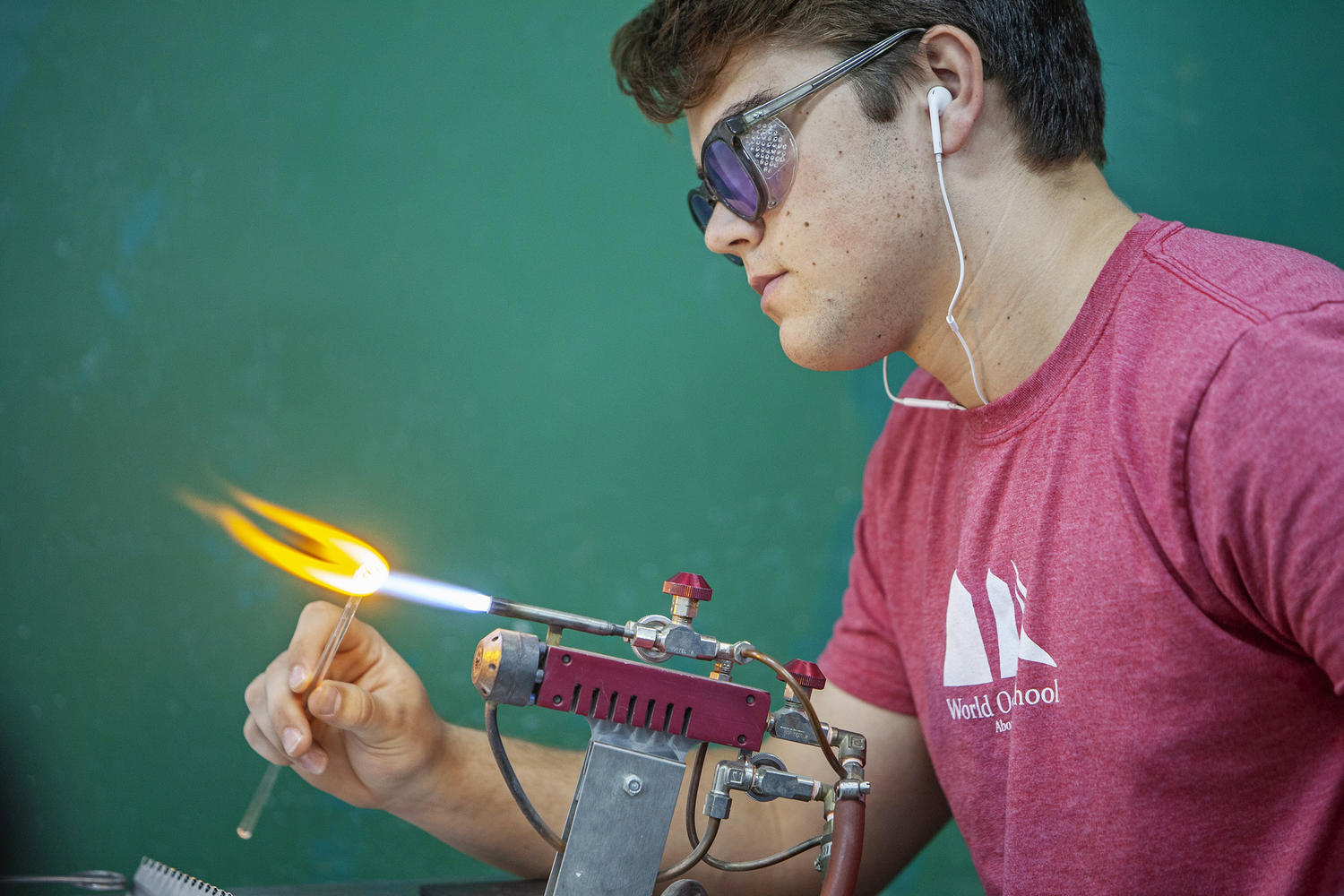 Jan R. '19 creating fish in glass torch-working class.